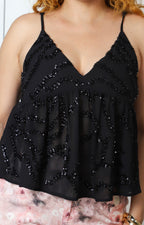 Blusa con escote en V y lentejuelas