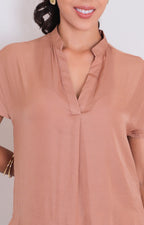 Blusa lisa con mangas