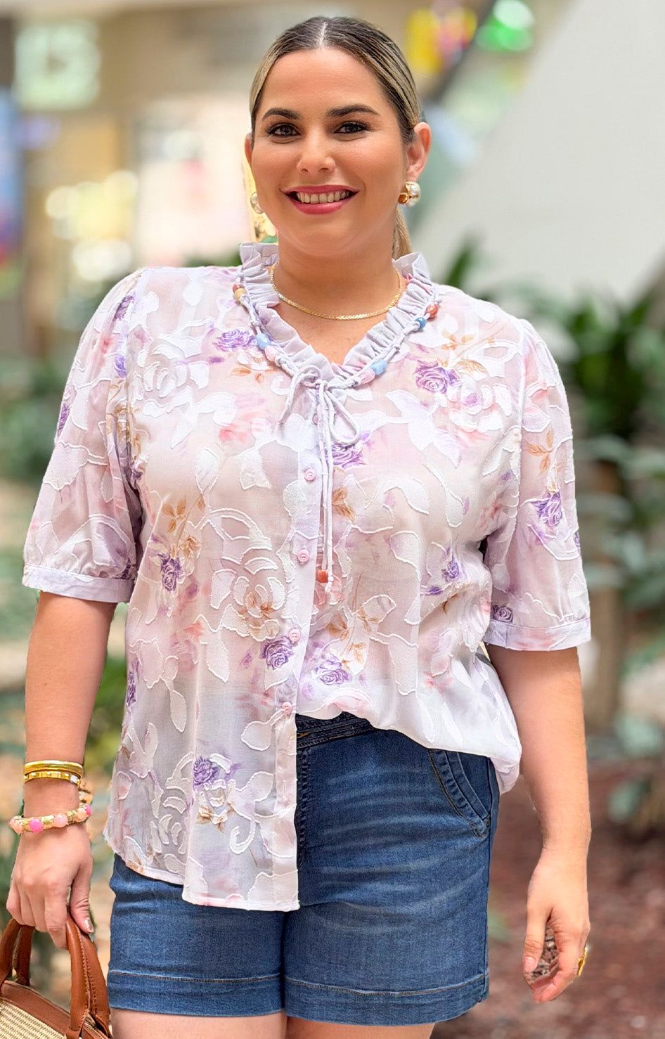 Blusa con estampado floral y bordado
