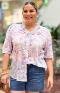 Blusa con estampado floral y bordado