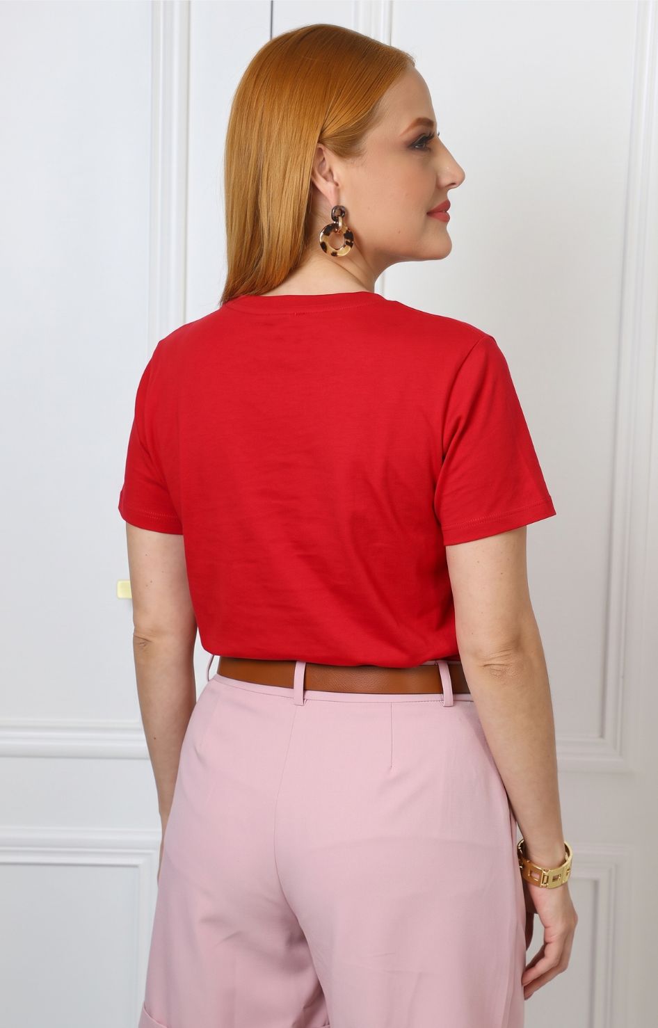 Blusa con estampado de cupido y aplicaciones