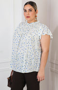Blusa floral con olanes y encaje