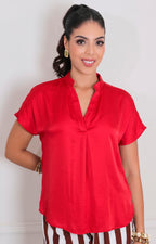 Blusa lisa con mangas