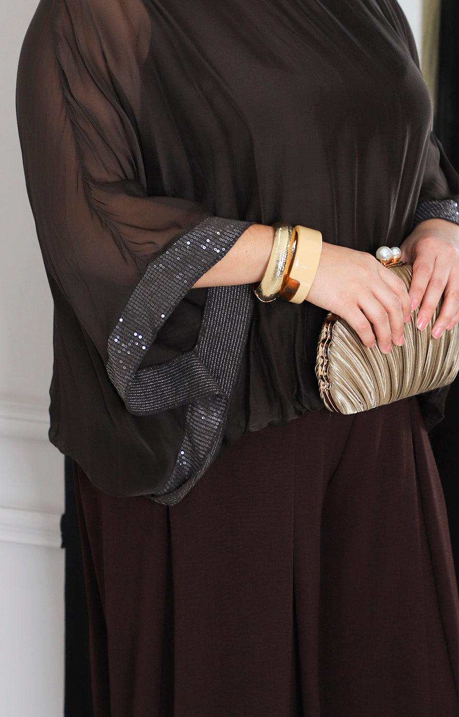 Blusa de seda con brillos