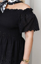 Blusa peplum con bordado calado