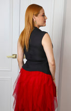 Blusa negra asimétrica con lazo
