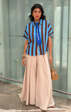 Blusa camisera a rayas con corbata decorativa