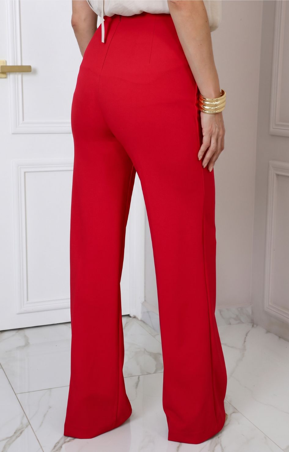 Pantalón con detalle dorado