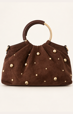 Bolsa redonda con tachuelas