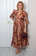 Vestido largo con estampado floral y cinturón