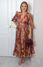 Vestido largo con estampado floral y cinturón