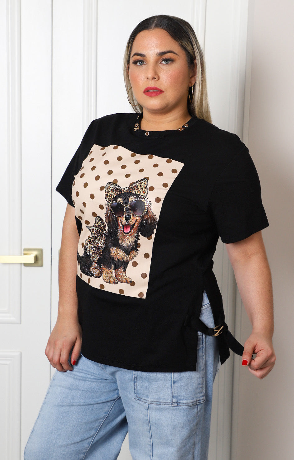 Blusa con estampado animal print y aplicaciones
