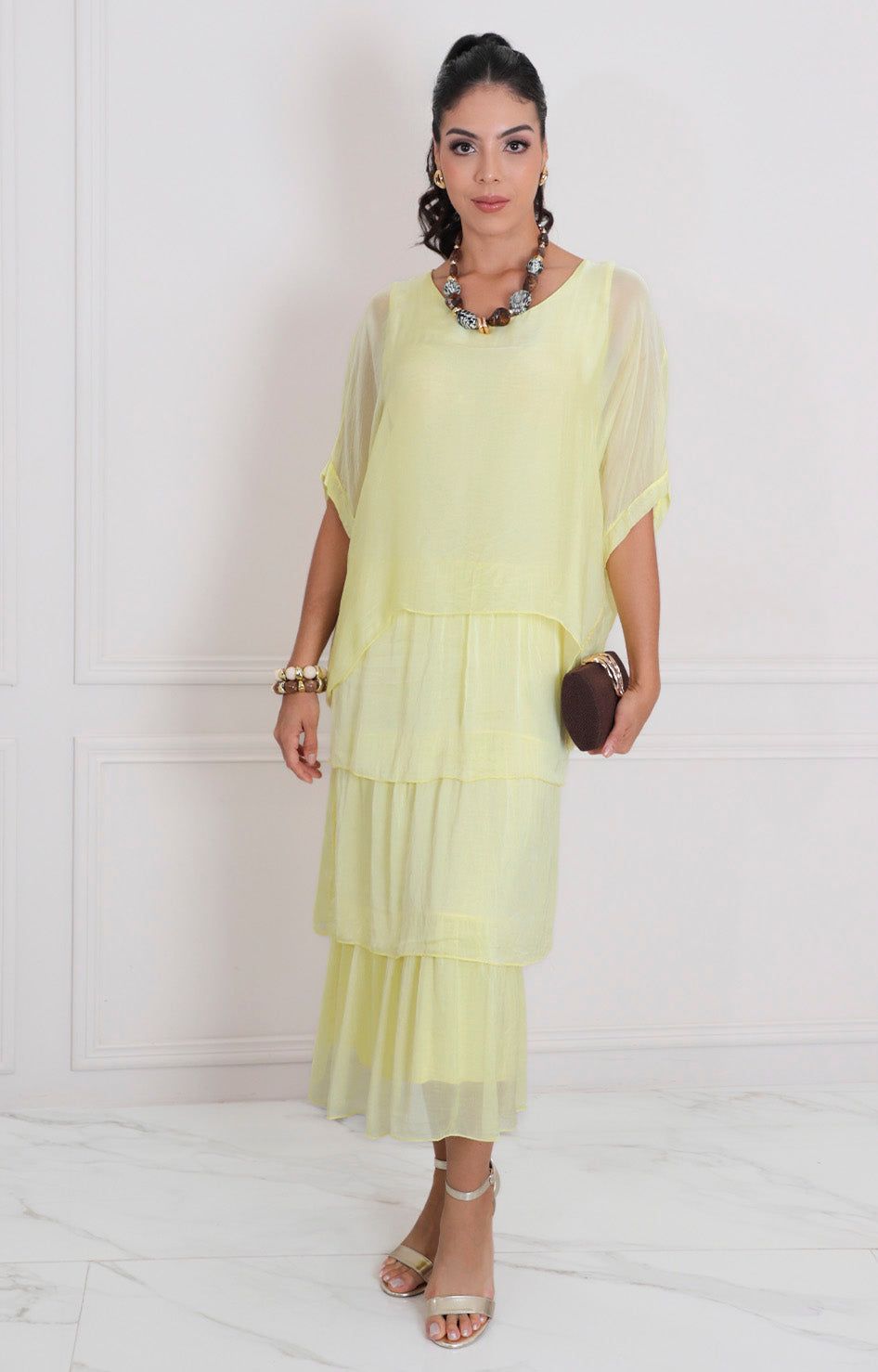 Vestido liso con volantes