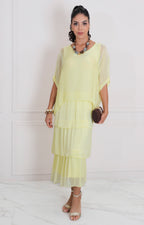 Vestido liso con volantes