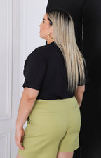 Blusa lisa con aplicaciones