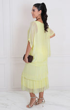 Vestido liso con volantes