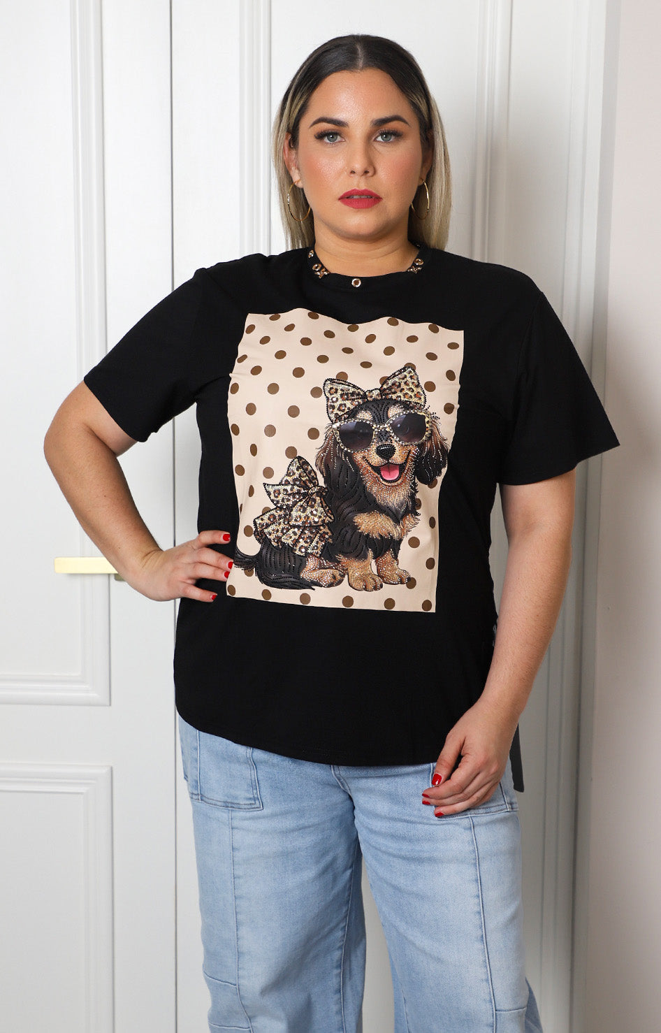 Blusa con estampado animal print y aplicaciones