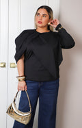 Blusa negra con drapeado y manga larga