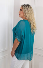 Blusa de seda de manga corta