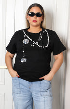 Blusa de algodón con aplicaciones