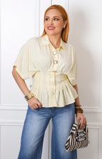 Blusa camisera amarilla tipo peplum