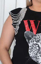 Blusa negra sin manga con aplicaciones