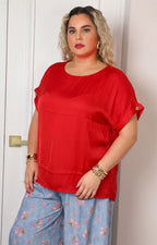 Blusa con detalle dorado en mangas