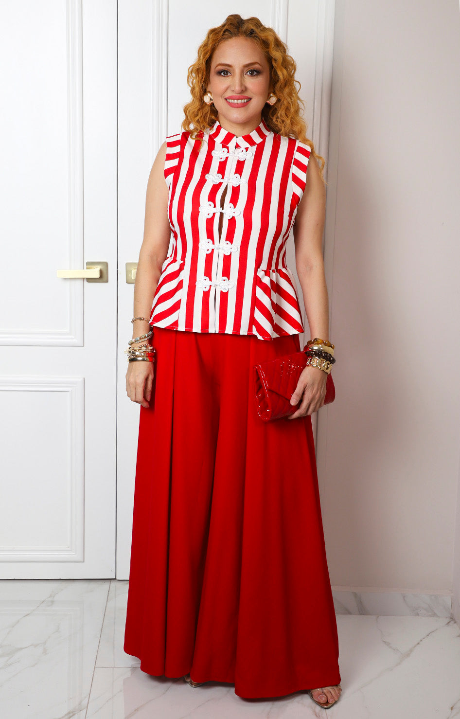 Blusa peplum de rayas con detalle bordado