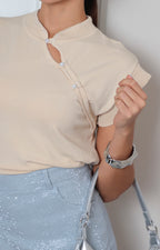 Blusa regular de Boutiquemirel con cierre diagonal de botones, tela suave y diseño elegante para ocasiones casuales.
