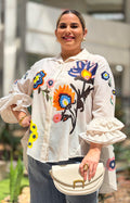 Blusa beige bordada