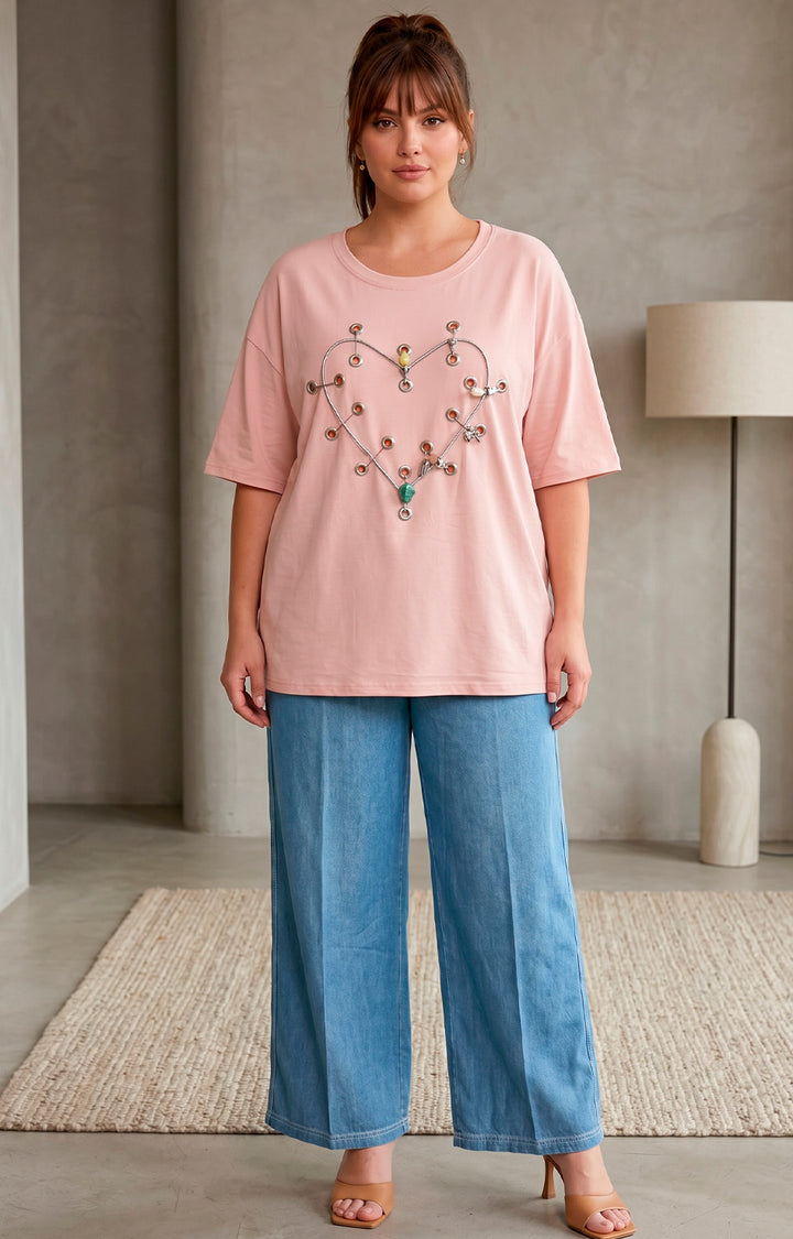 Blusa rosa con aplicaciones metálicas