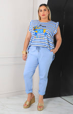 Blusa azul de rayas con olanes