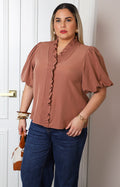Blusa café con mangas globo y olanes