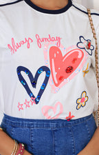 Blusa blanca con aplicaciones