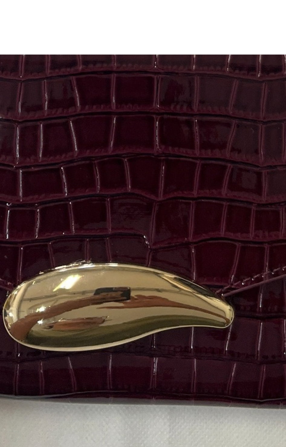 Bolso clutch acolchado con cadena