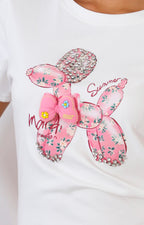Blusa blanca con estampado y aplicaciones