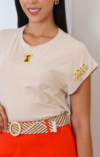 Blusa con aplicaciones metálicas