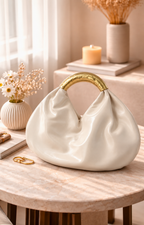 Bolsa pouch con asa dorada