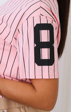 Blusa de rayas y aplicaciones de brillo