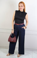Pantalón azul de pierna ancha con dobladillo