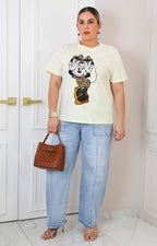 Blusa amarilla con estampado y brillos
