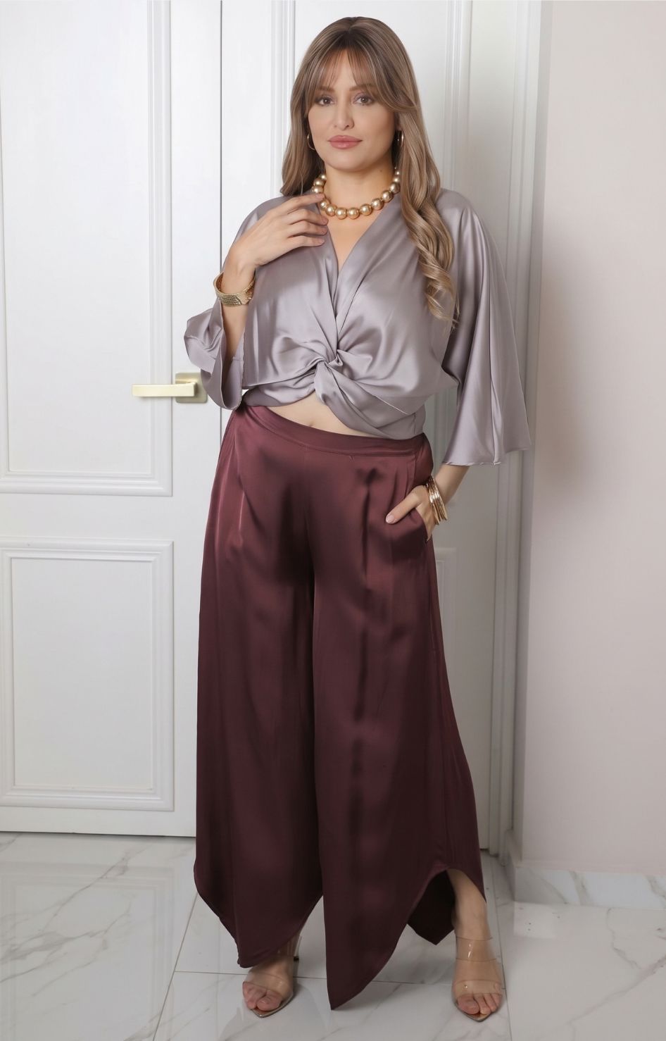 Blusa con nudo frontal satinada