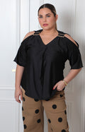 Blusa con hebillas y mangas campana