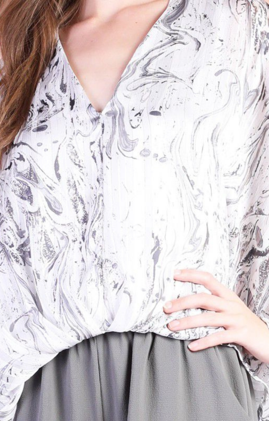 Blusa gris estampada