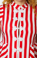 Blusa peplum de rayas con detalle bordado