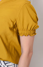 Blusa escote en V con mangas fruncidas