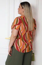 Blusa con escote en V y estampado ondulado