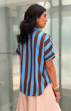 Blusa camisera a rayas con corbata decorativa