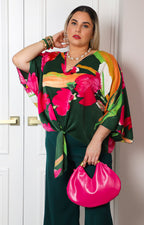 Blusa con estampado floral y nudo