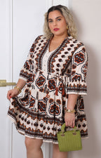 Vestido con estampado geométrico y lazo
